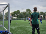 Laatste training S.K.N.W.K. JO11-1JM (partijtje tegen de ouders) van maandag 27 mei 2024 (131/137)